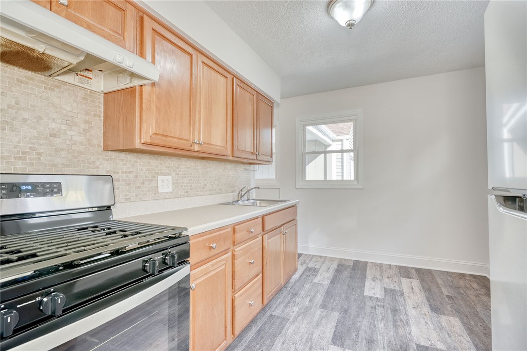 29 Seneca Street Webster, NY 14580 - Photo 12 of 44 KITCHEN W/SS APPLIANCES * LUXURY VINYL FLOOR