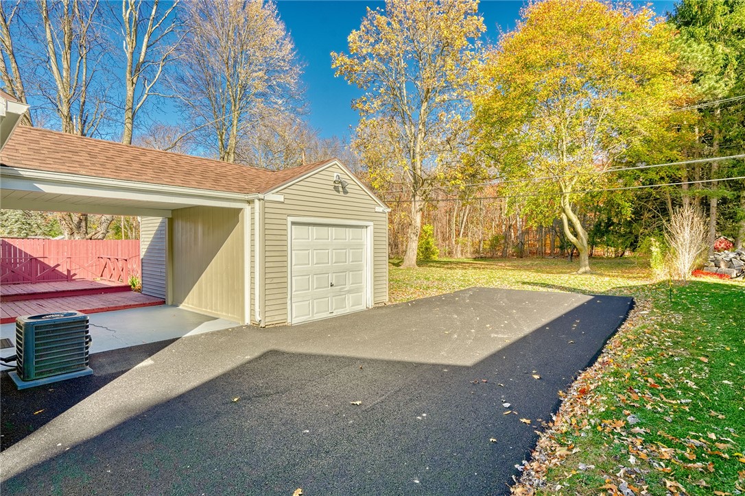 29 Seneca Street Webster, NY 14580 - Photo 5 of 44 NEW PAVED DRIVEWAY LEADS TO GARAGE, COVERED PATIO,