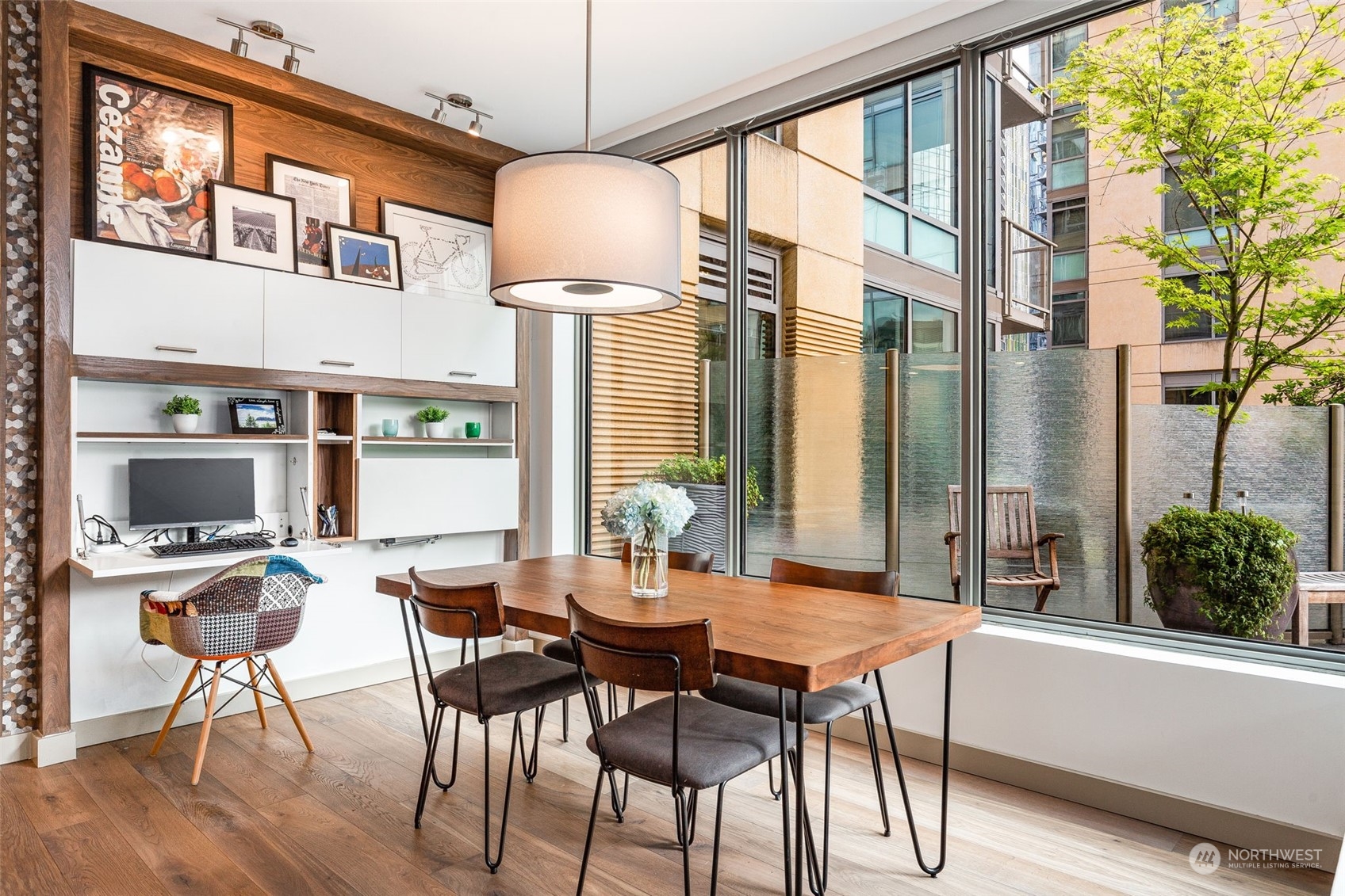 910 Lenora Street, Unit S310 Seattle, WA 98121 - Photo 12 of 40 a view of a dining room with furniture window and outside view