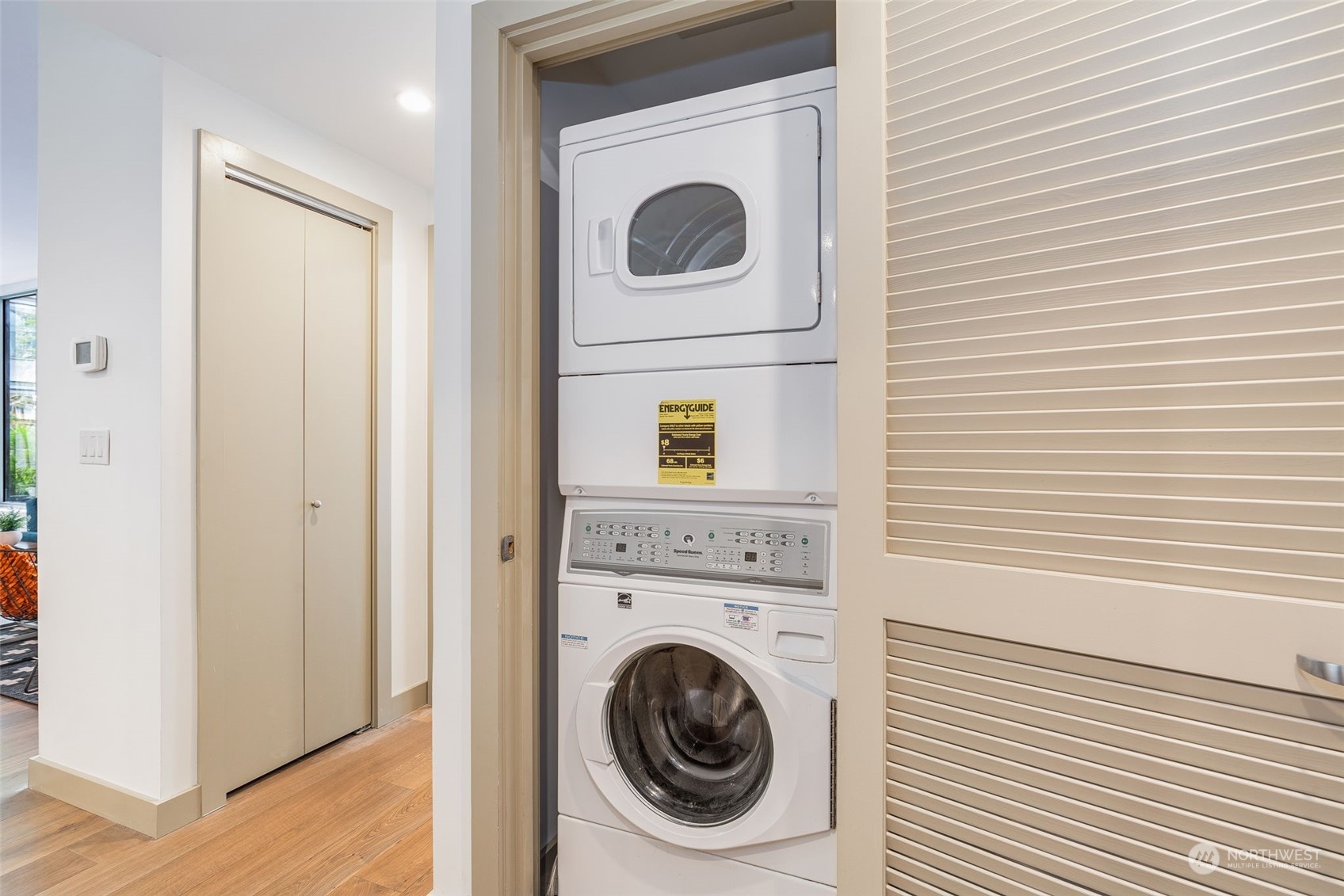 910 Lenora Street, Unit S310 Seattle, WA 98121 - Photo 27 of 40 a utility room with dryer and washer