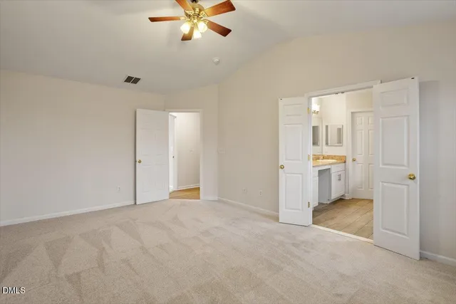 a view of a kitchen with a sink and cabinet area