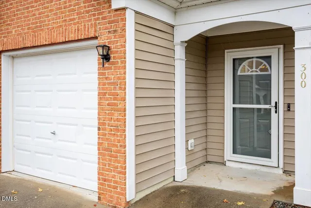 a view of front door and a window