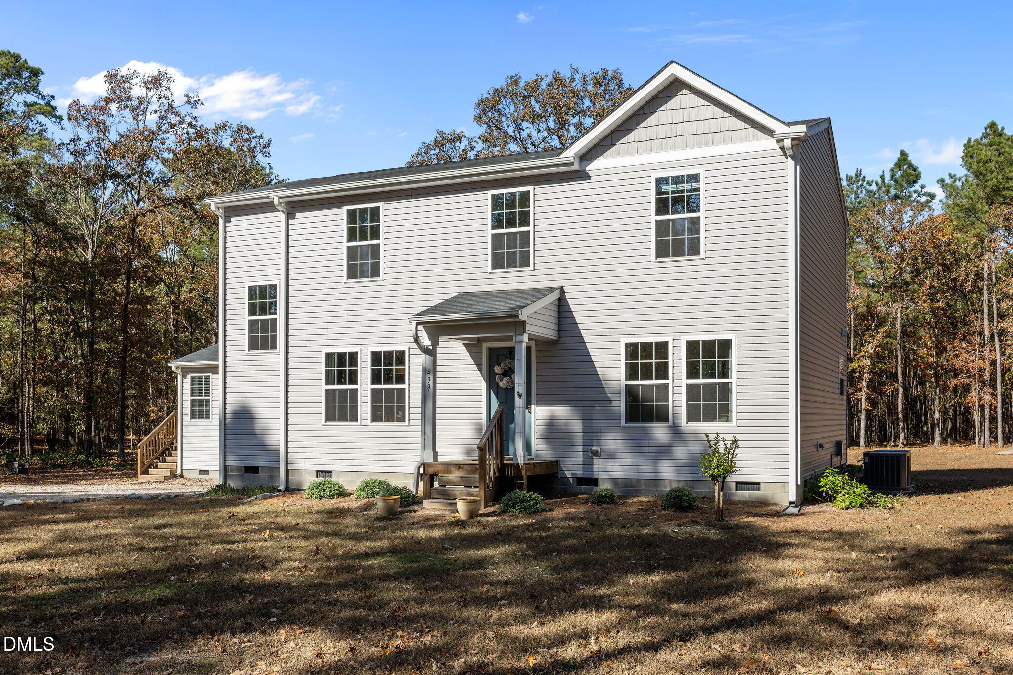 499 Jumping Run Road Dunn, NC 28334 - Photo 2 of 42 a view of a house with backyard