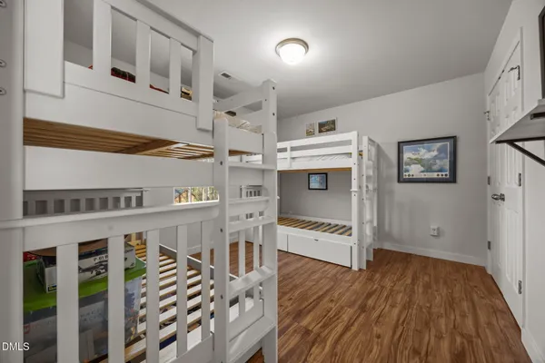 a view of a livingroom with wooden floor