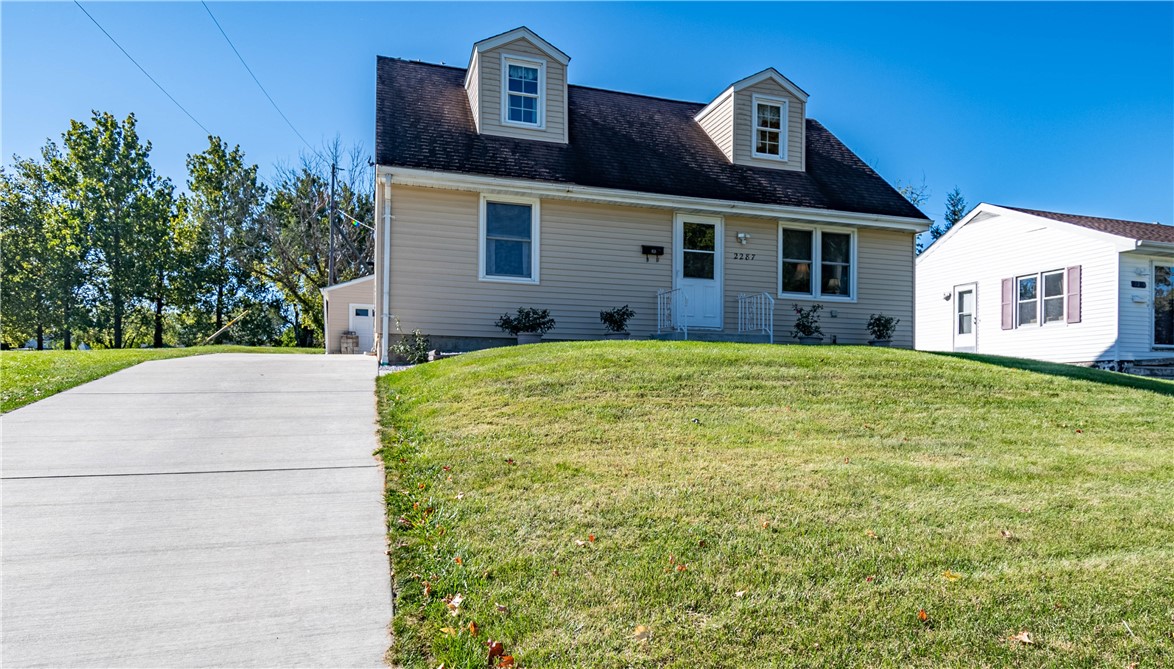 2287 West Cushing Street Decatur, IL 62526 - Photo 1 of 23 a front view of a house with a yard