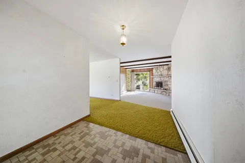 a kitchen with a stove and a sink