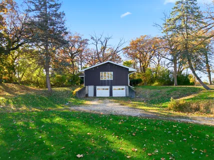 a view of a big yard next to a house