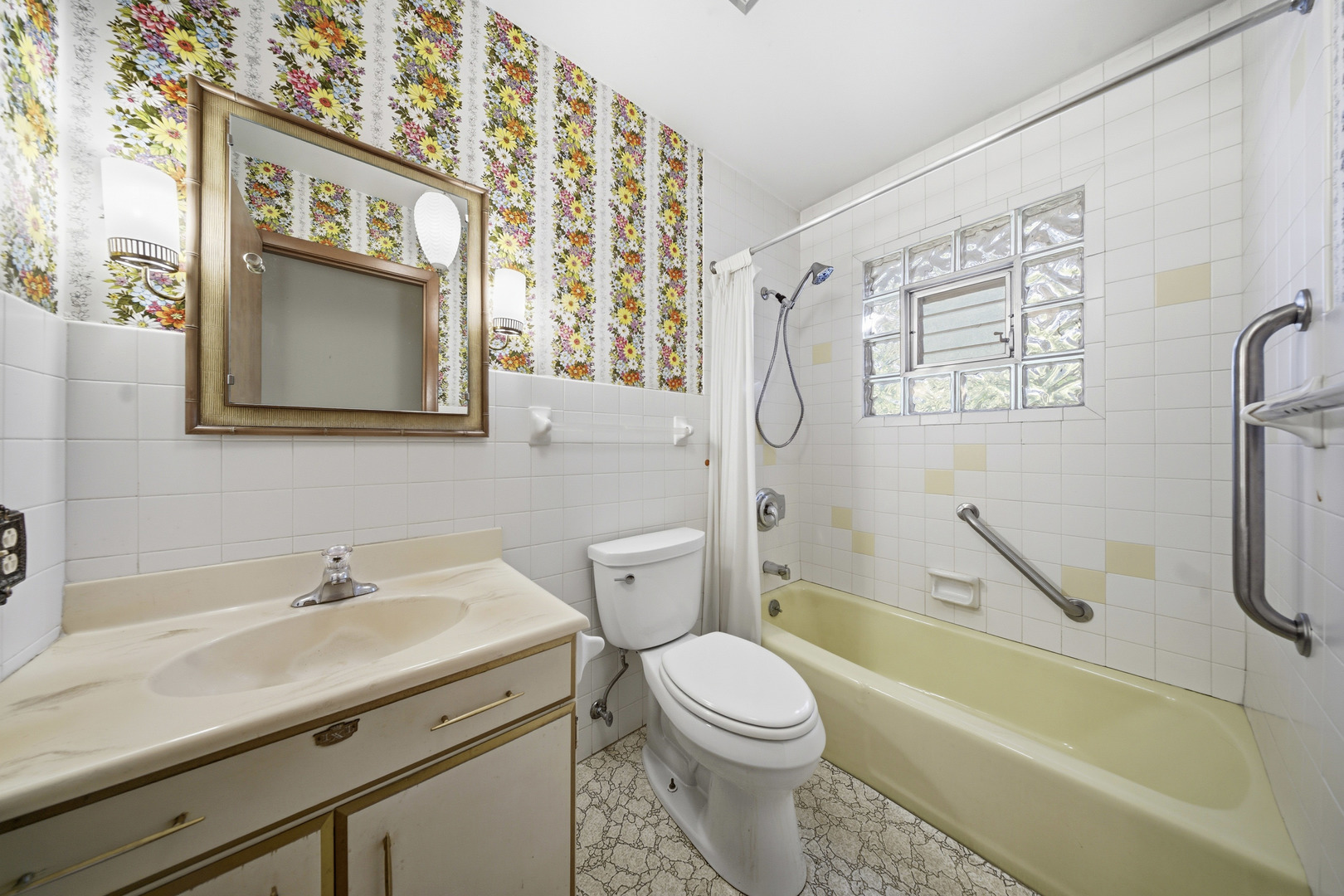 3805 Klasen Road Cary, IL 60013 - Photo 35 of 65 a bathroom with a sink a mirror a toilet and a bathtub