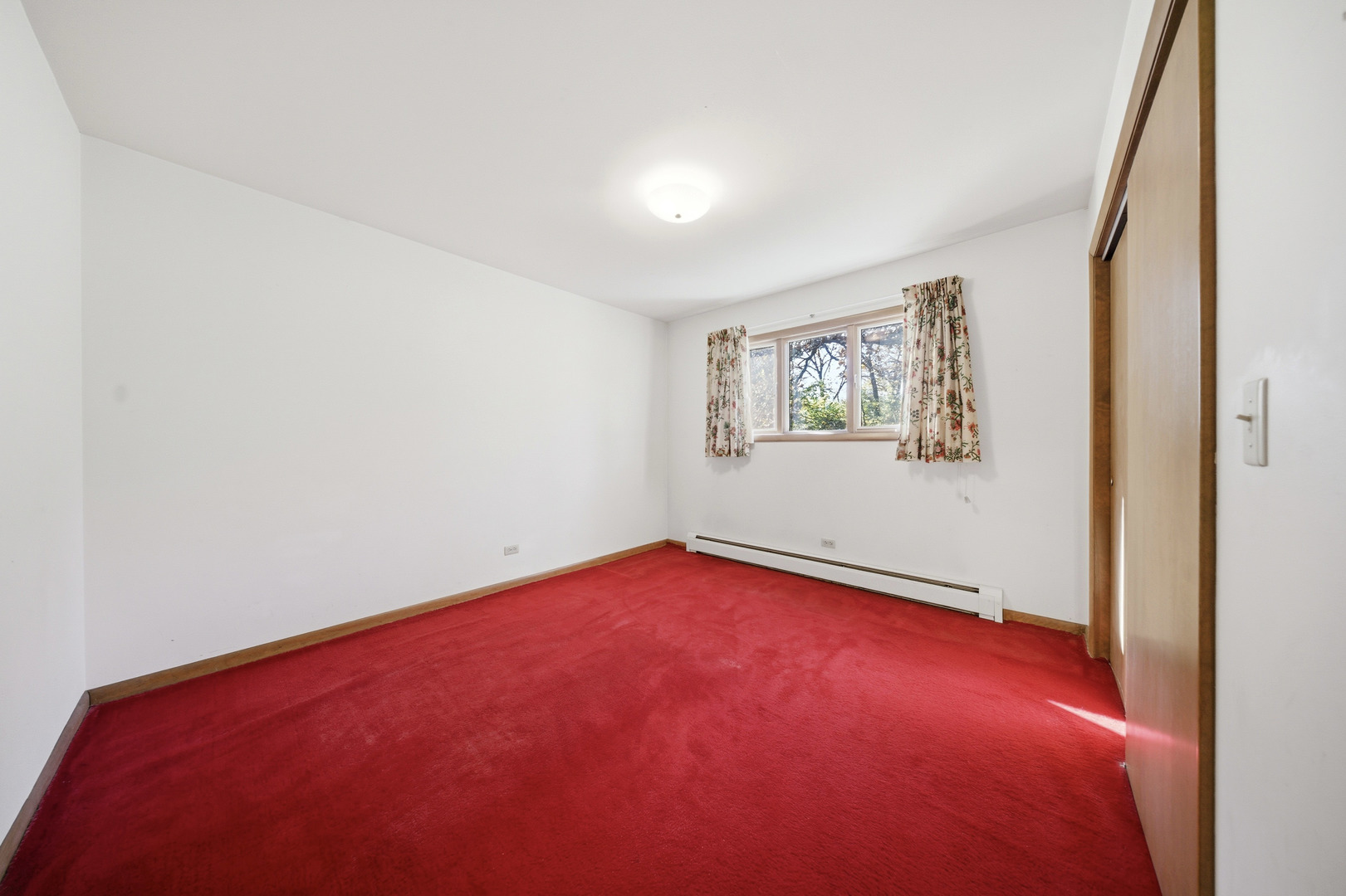 3805 Klasen Road Cary, IL 60013 - Photo 40 of 65 an empty room with a window and a projector screen