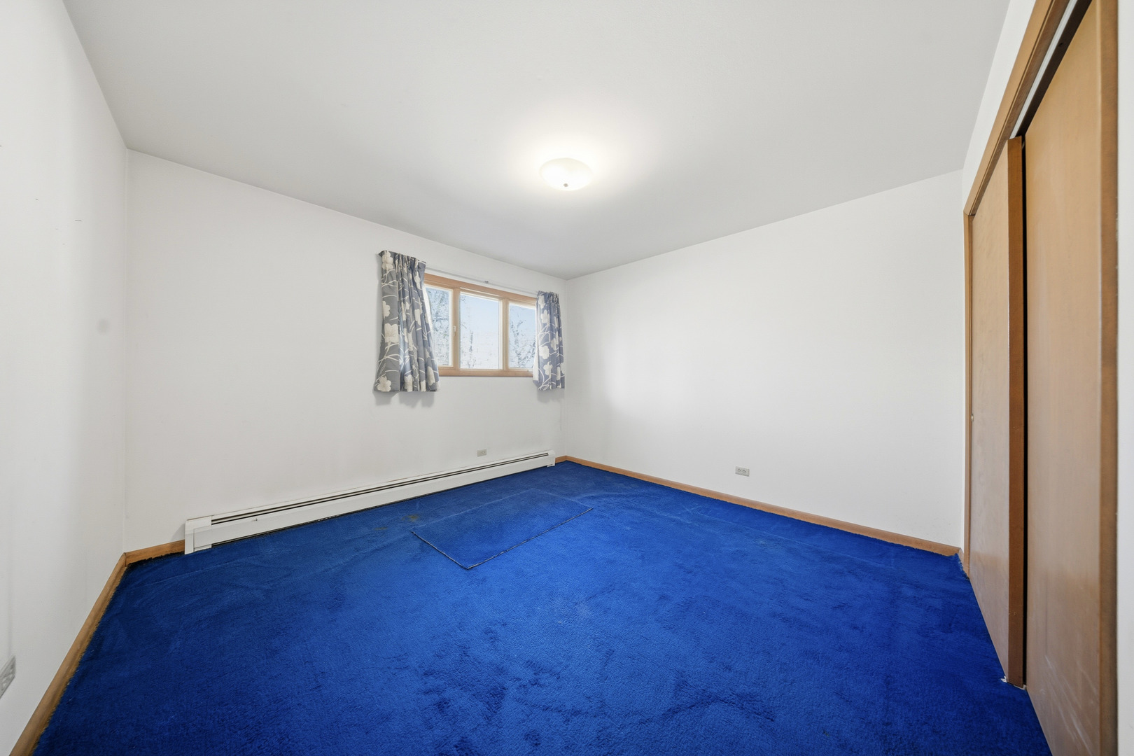 3805 Klasen Road Cary, IL 60013 - Photo 42 of 65 an empty room with wooden floor and windows