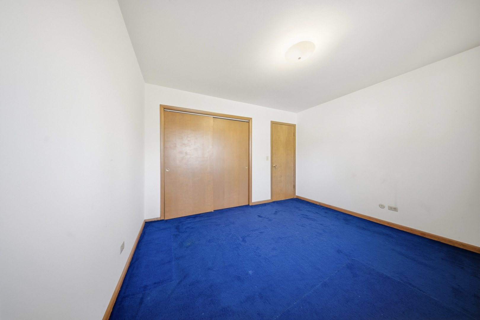 3805 Klasen Road Cary, IL 60013 - Photo 43 of 65 a view of an empty room with wooden floor and closet