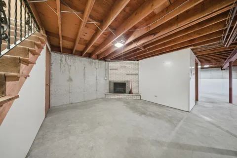 a view of a chairs and table in a room