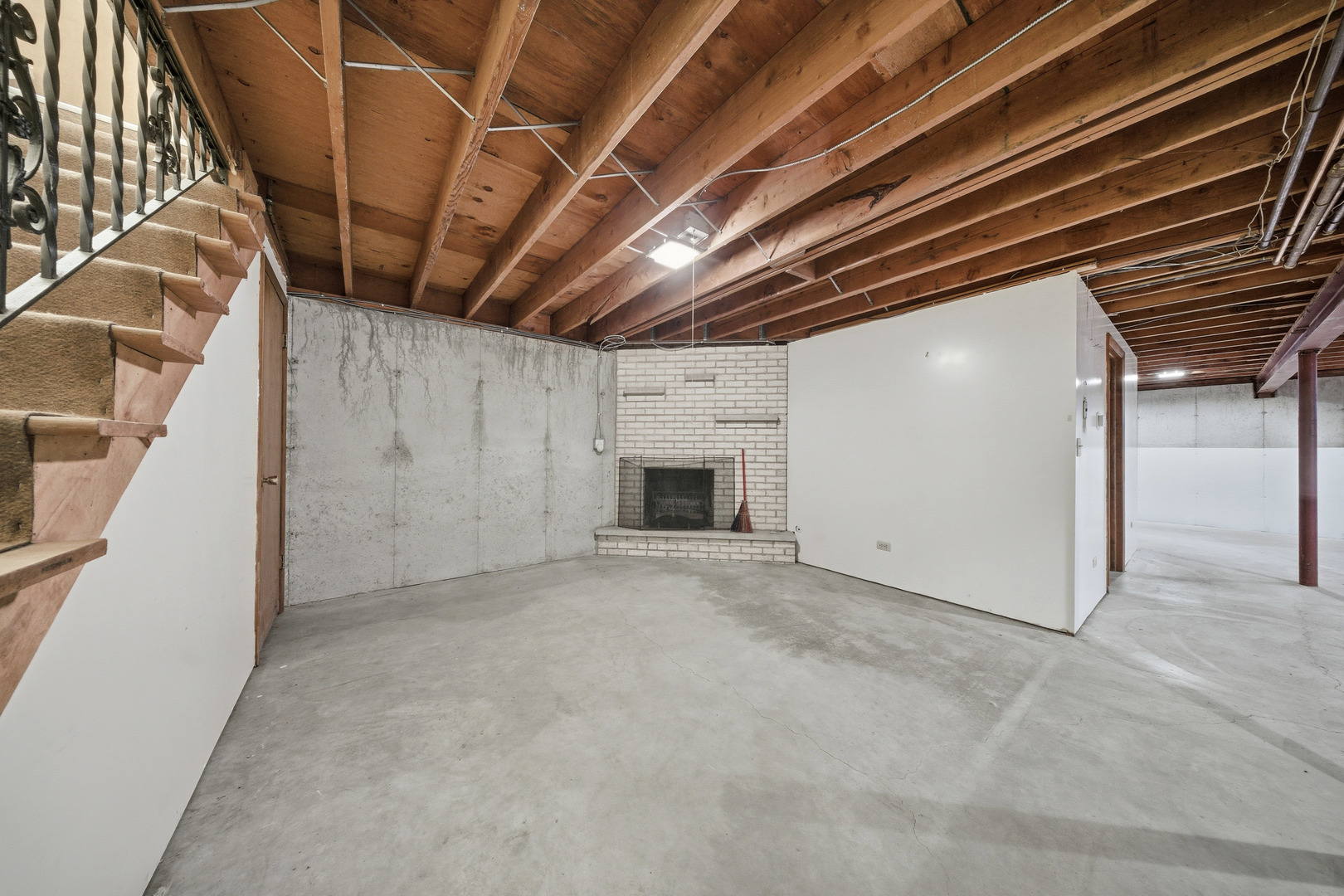 3805 Klasen Road Cary, IL 60013 - Photo 45 of 65 a view of an empty room with a fireplace