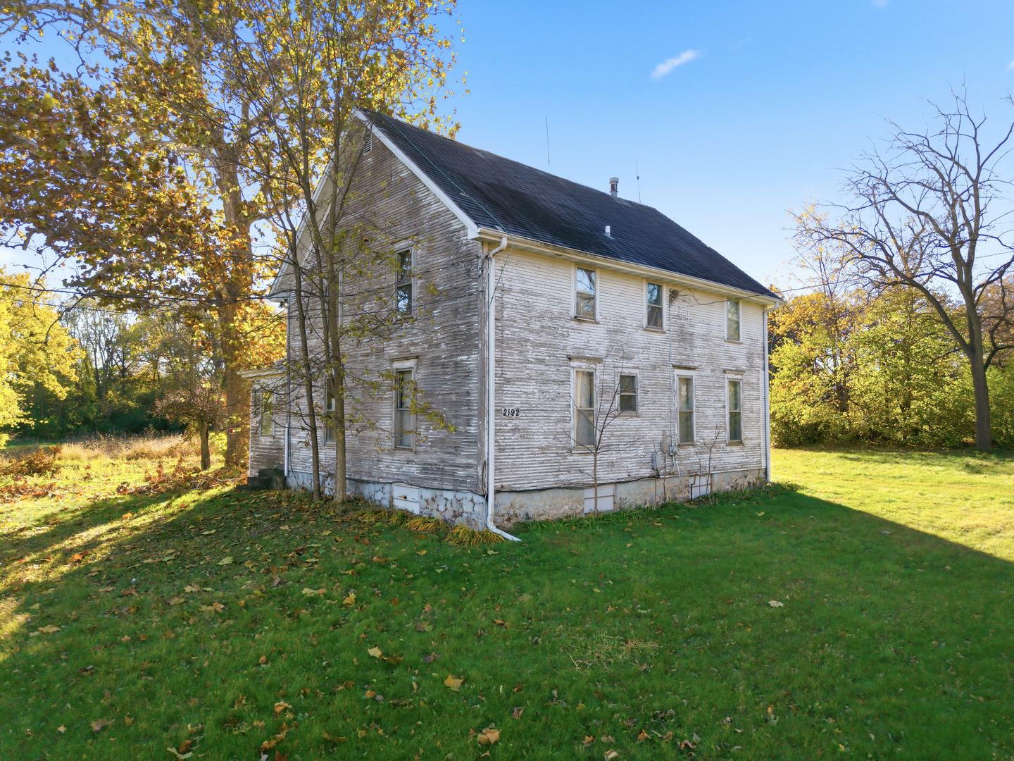 3805 Klasen Road Cary, IL 60013 - Photo 51 of 65 a view of a back yard of the house with a large tree