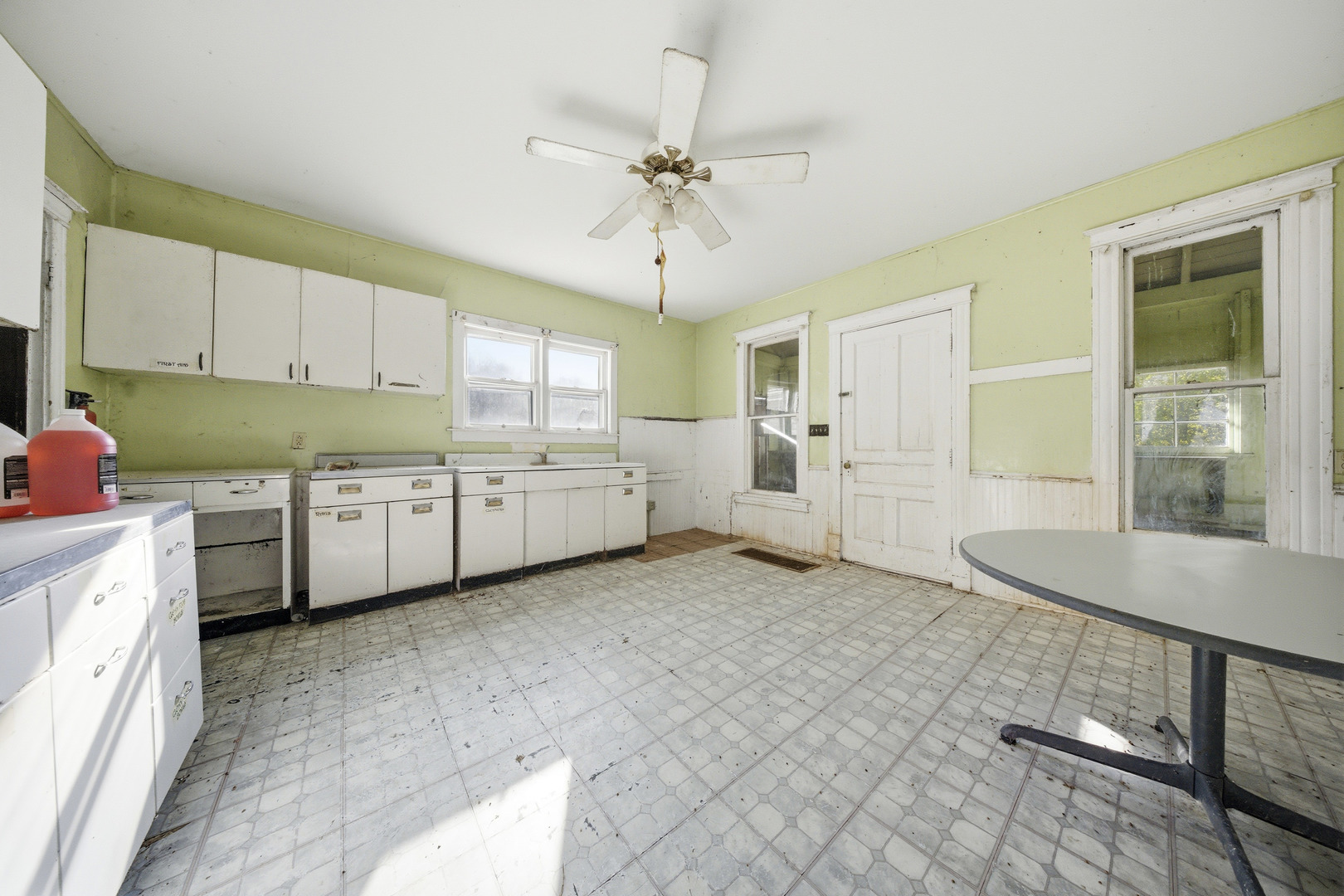 3805 Klasen Road Cary, IL 60013 - Photo 53 of 65 a view of a kitchen with a sink cabinets and window