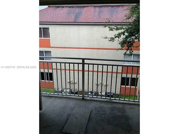 a view of a balcony with an outdoor space