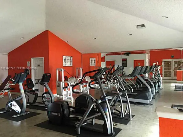 a view of a room with gym equipment