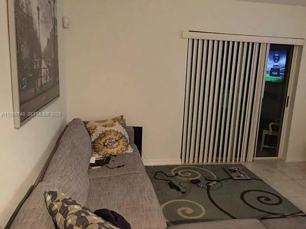 a view of a livingroom with furniture