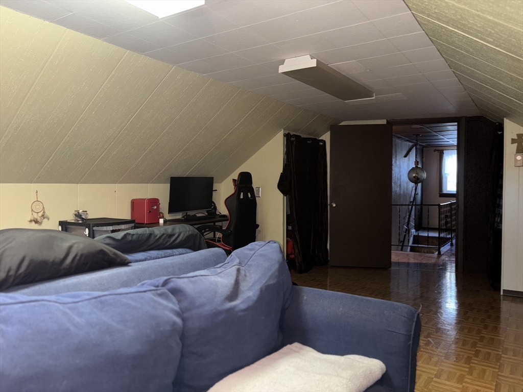 657 Pleasant Street Rochdale, MA 01542 - Photo 20 of 28 a living room with furniture and wooden floor