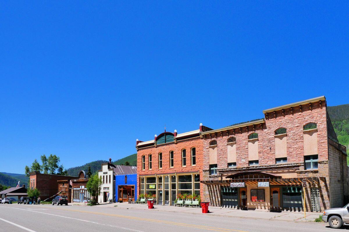 27 North Commercial Street Rico, CO 81332 - Photo 14 of 17 a large building with a street