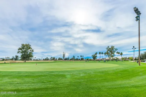 a view of a street with houses on both side