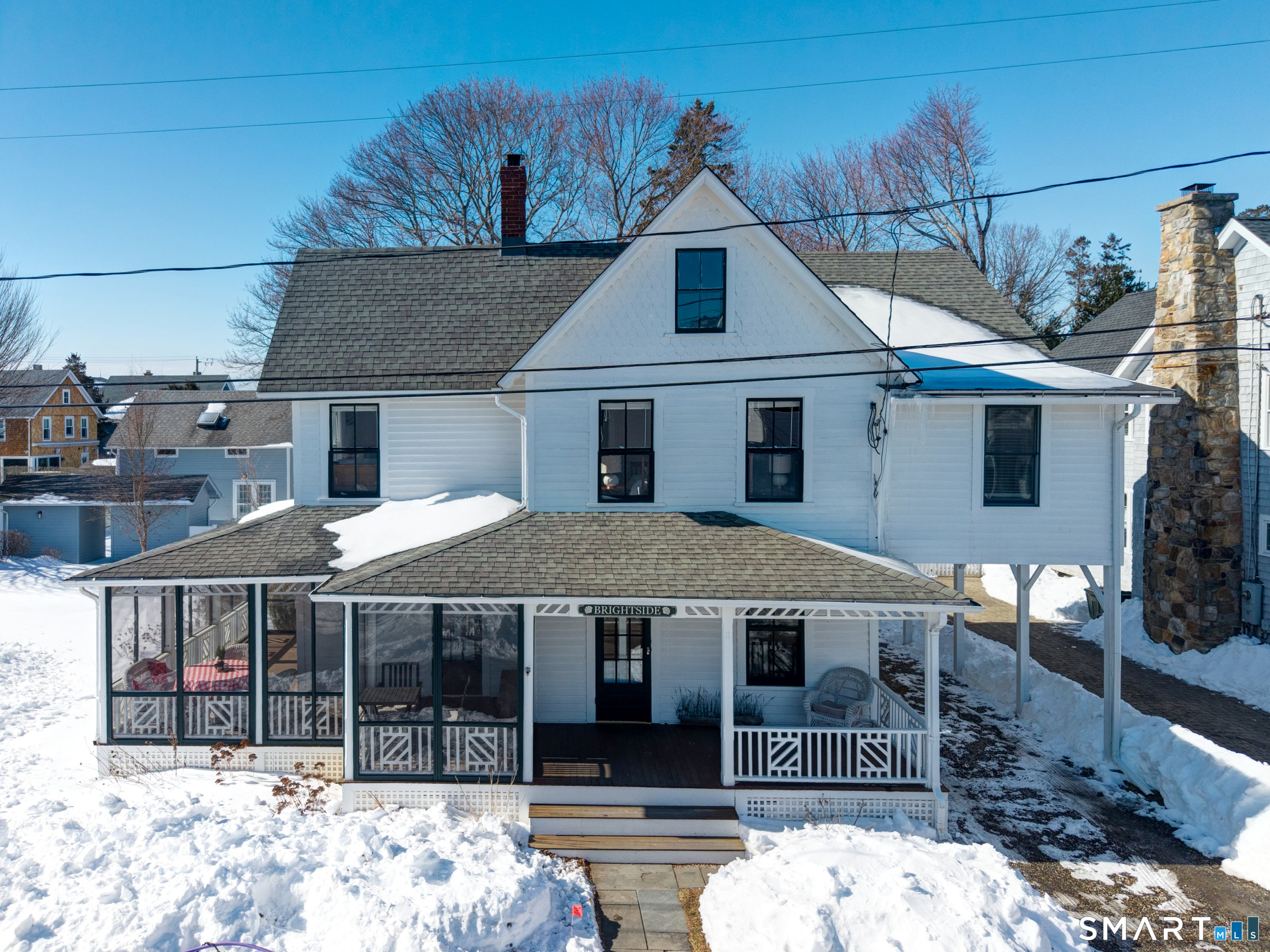 WELCOME HOME... "Brightside" offers four bedrooms and two full baths in this quintessential beach house.