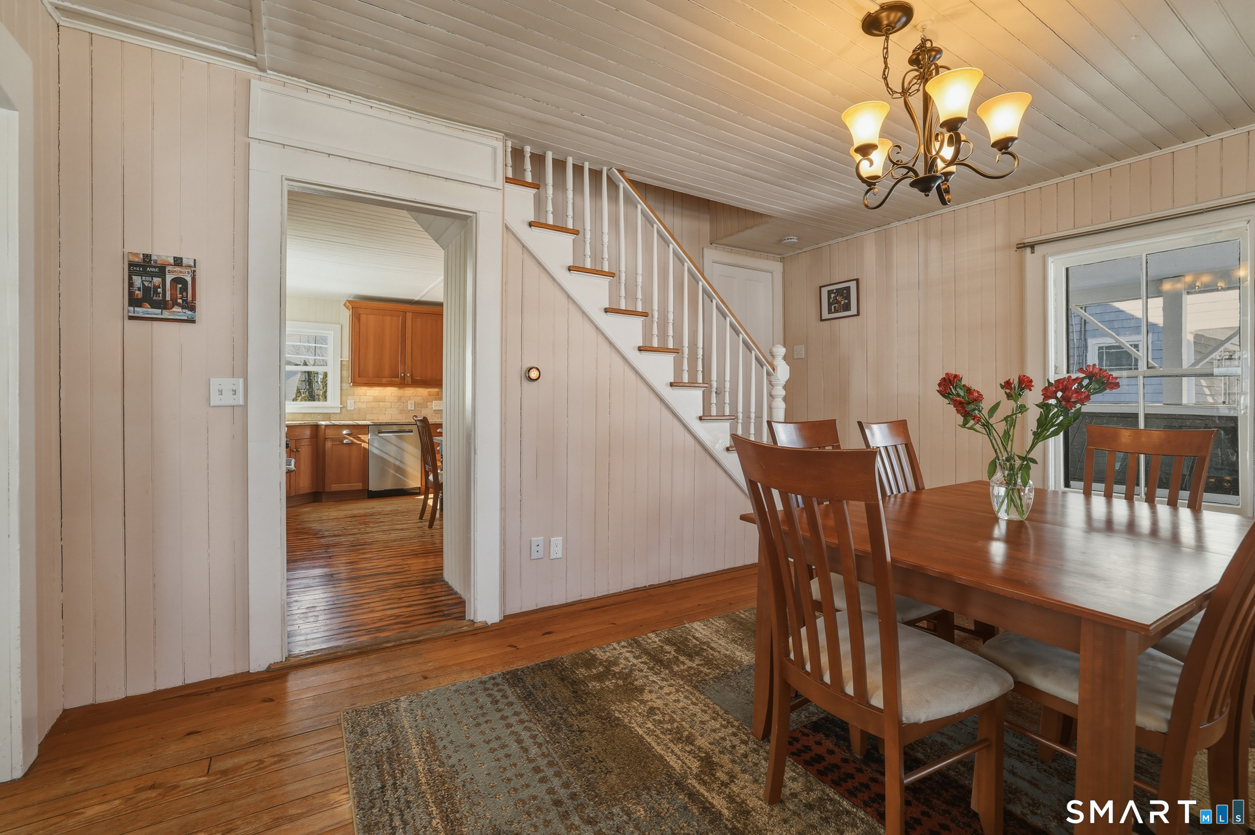 11 Tuxis Road Madison, CT 06443 - Photo 11 of 40 Front dining room provides access to both the living room and the eat-in kitchen.