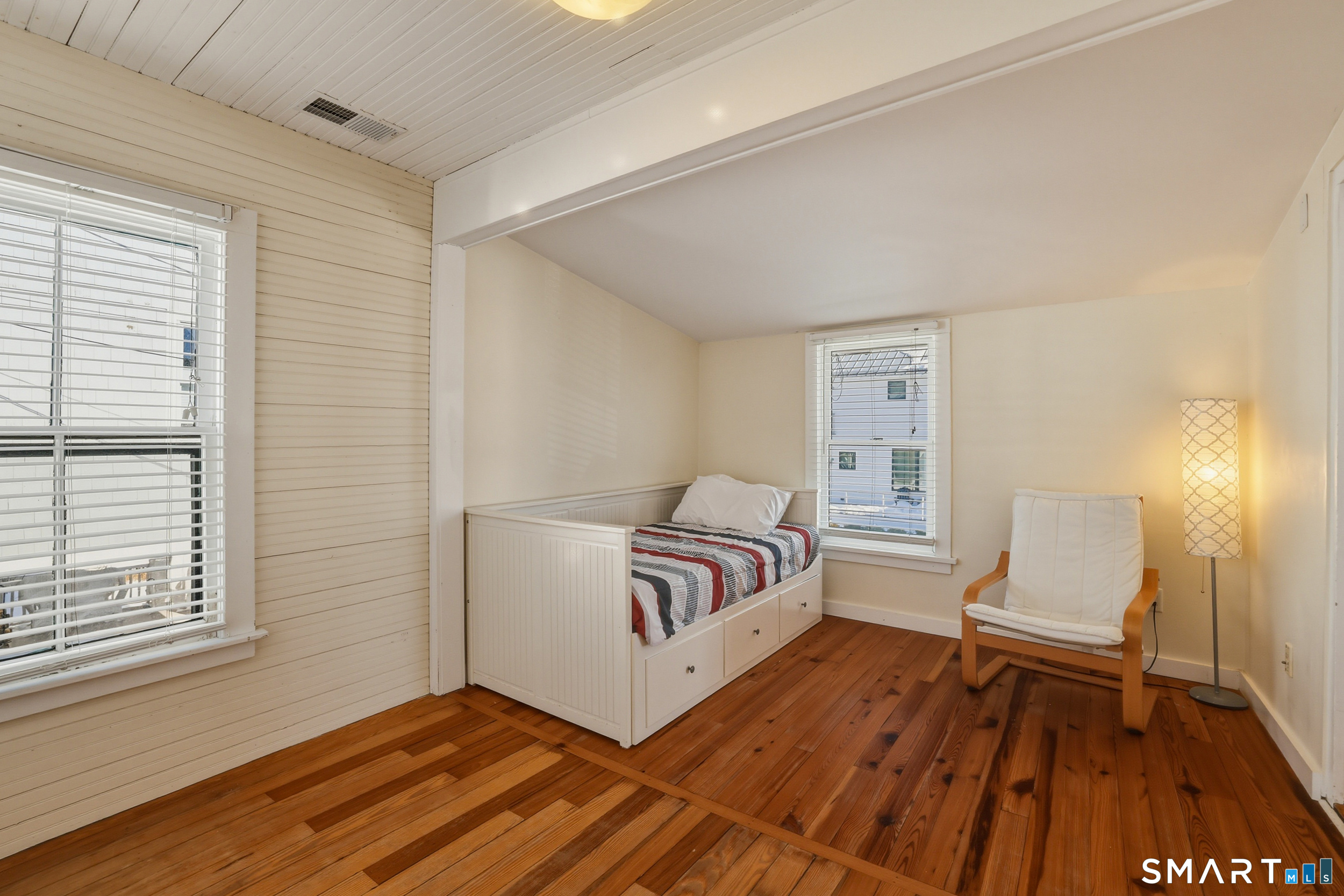 11 Tuxis Road Madison, CT 06443 - Photo 23 of 40 Fourth bedroom doubles as a guest room and presently houses the washer and dryer in the closet.