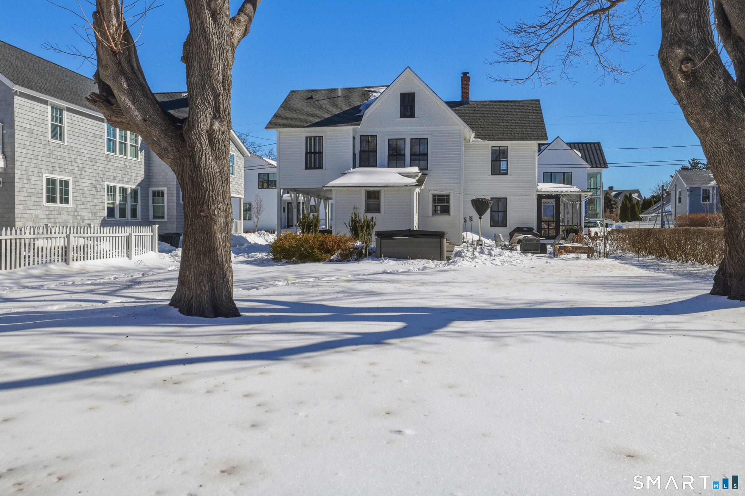 11 Tuxis Road Madison, CT 06443 - Photo 29 of 40 View of back of house and backyard.