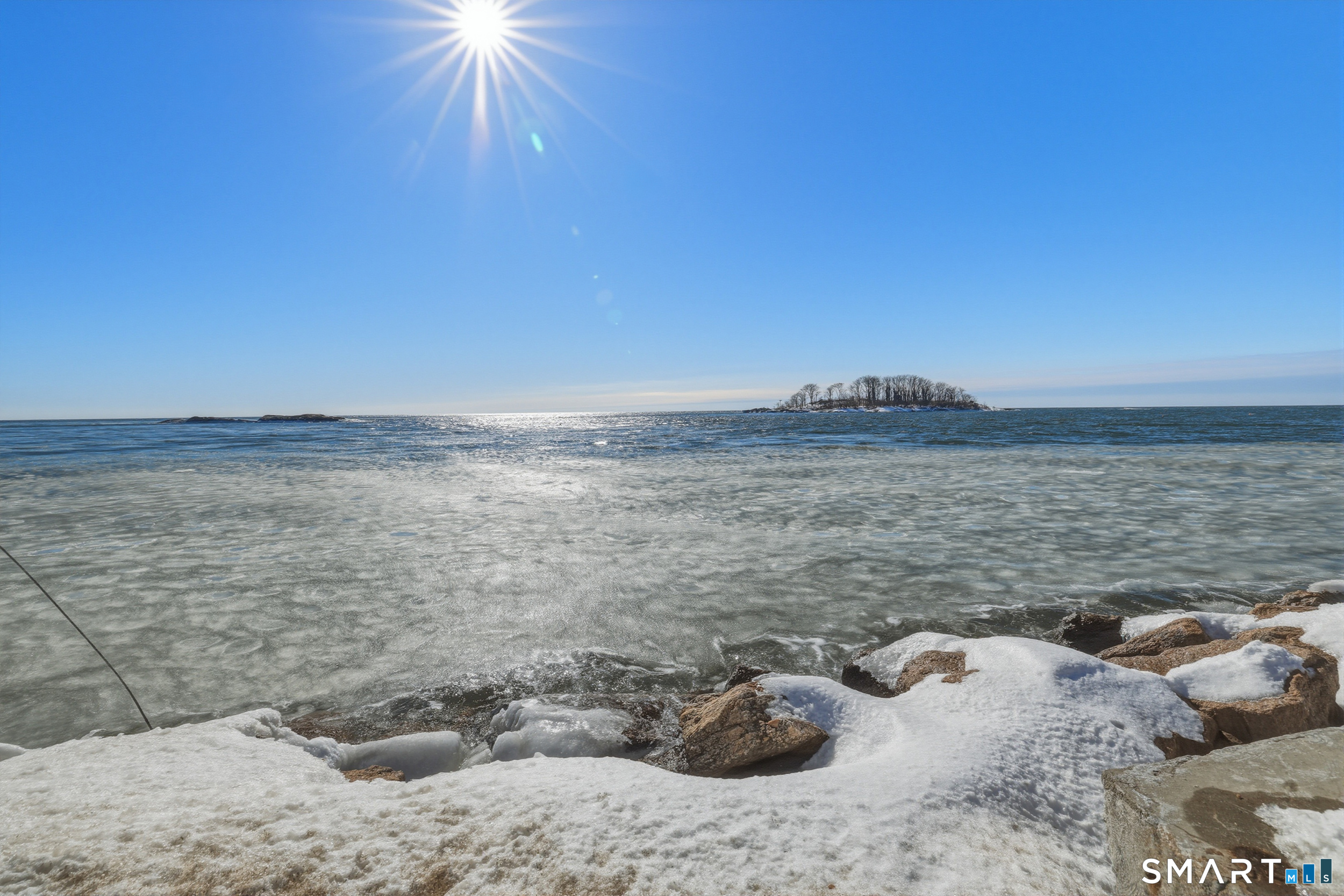 11 Tuxis Road Madison, CT 06443 - Photo 36 of 40 Water is just steps away from this coastal retreat.