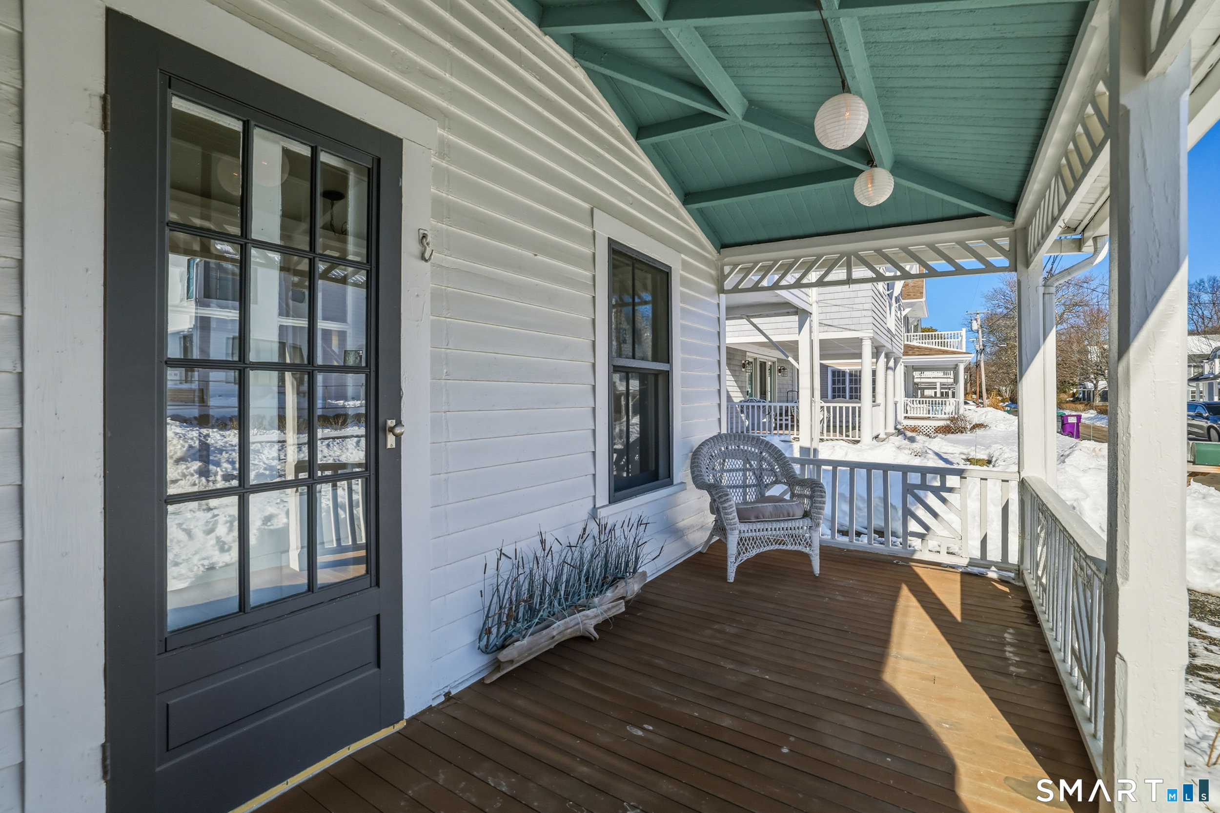11 Tuxis Road Madison, CT 06443 - Photo 6 of 40 Enter through the covered front porch into the dining room, with additional access to the living room from the screened wraparound porch.