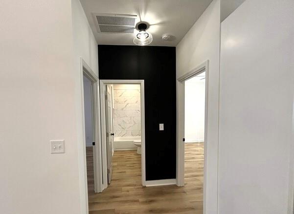 143 Addie Jane Lane Buchanan, GA 30113 - Photo 22 of 31 a view of a hallway with wooden floor
