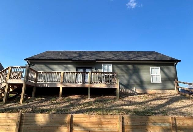 143 Addie Jane Lane Buchanan, GA 30113 - Photo 29 of 31 a view of a house with roof deck