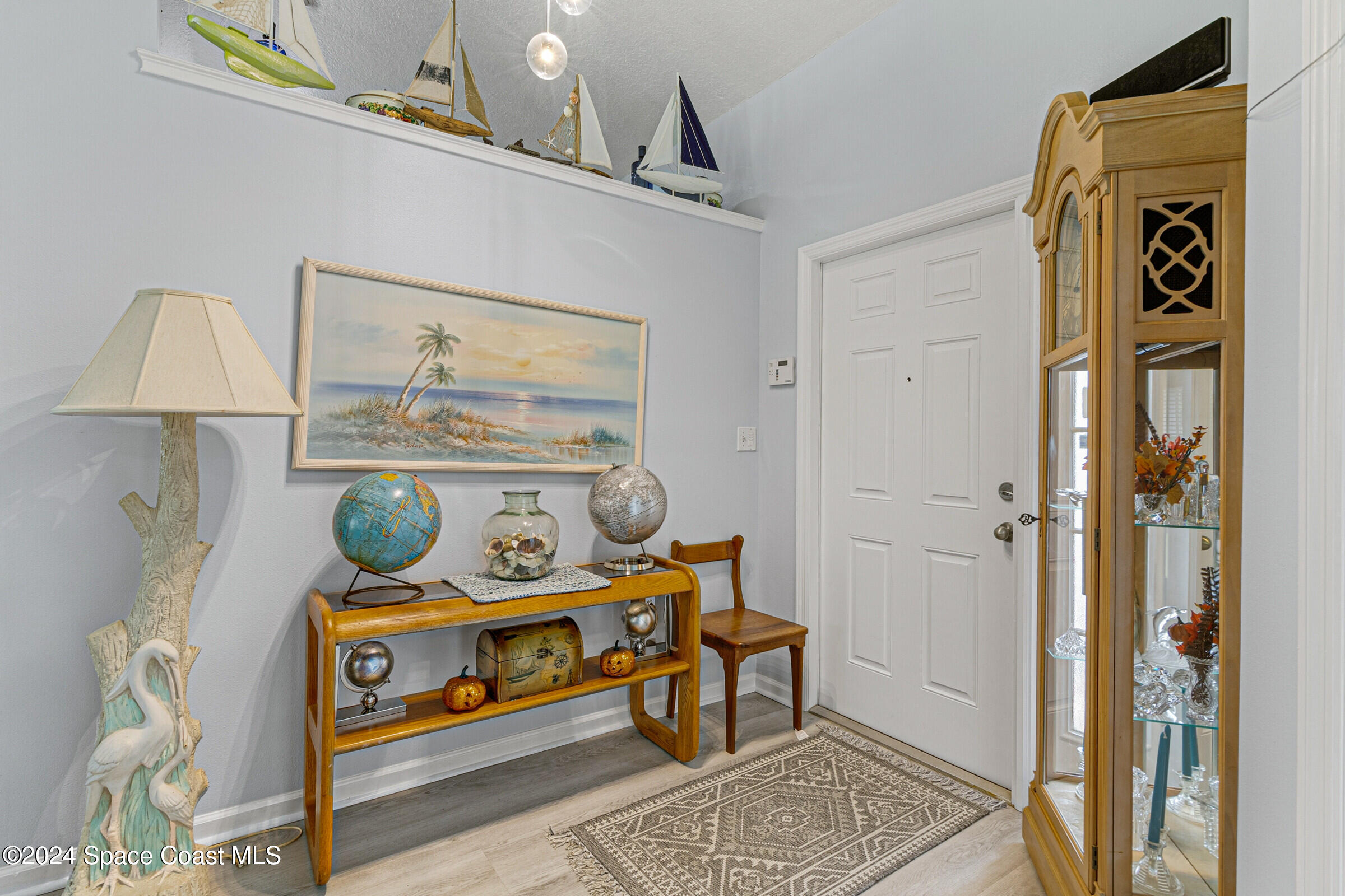 931 Pandora Road Southeast Palm Bay, FL 32909 - Photo 12 of 34 a utility room with dryer and washer