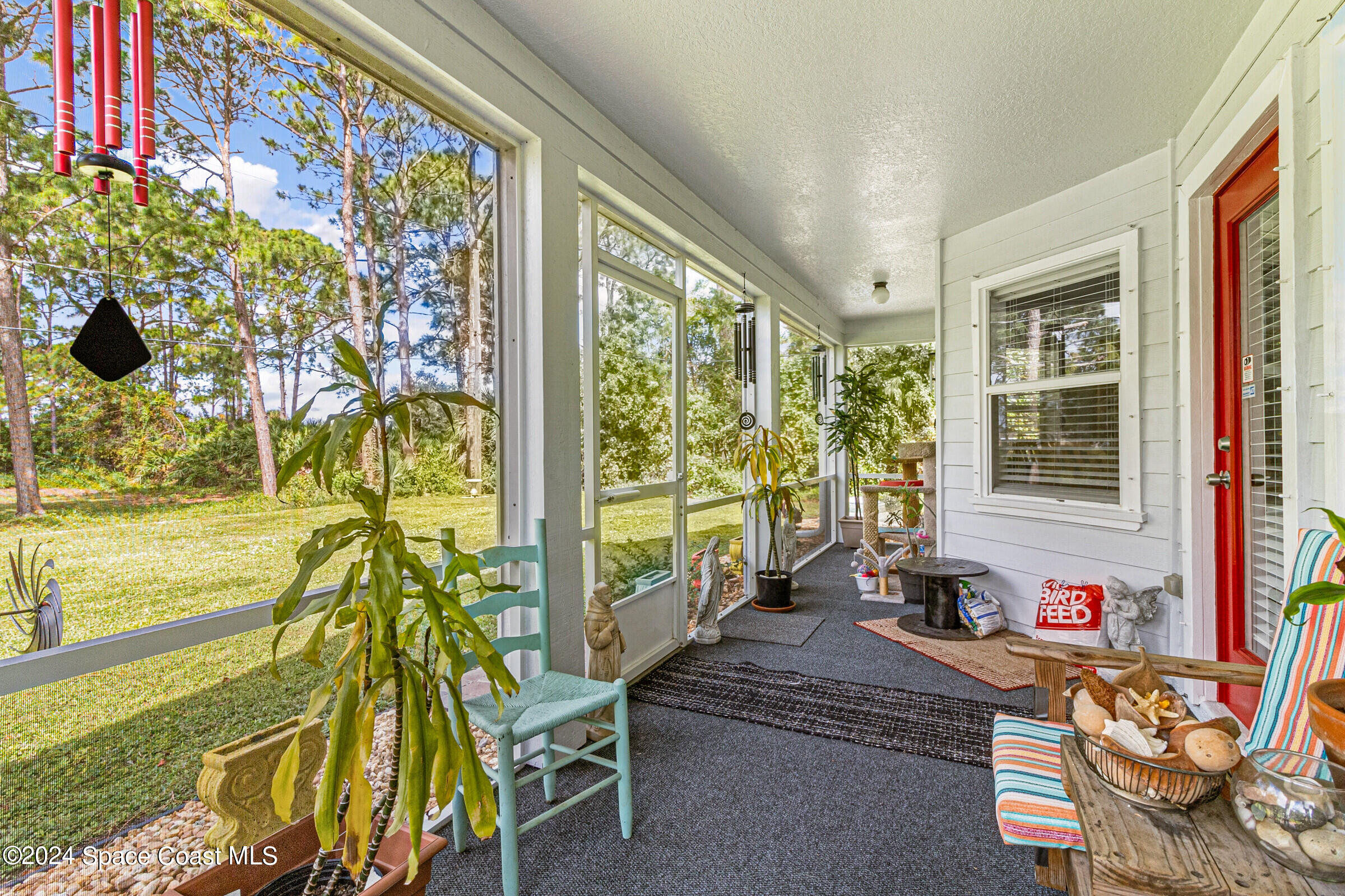 931 Pandora Road Southeast Palm Bay, FL 32909 - Photo 27 of 34 a living room filled with furniture