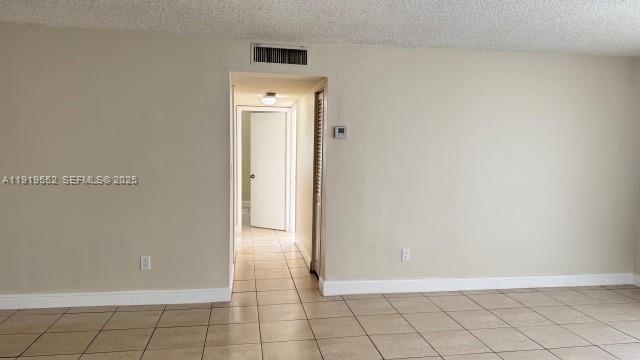 486 Northwest 165th Street, Unit B302 Miami, FL 33169 - Photo 14 of 34 a view of an empty room