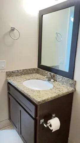 a bathroom with a shower and a toilet