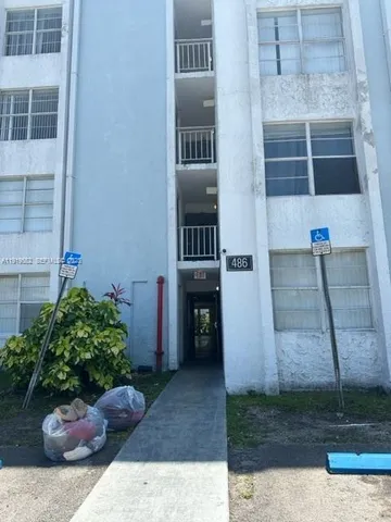 a view of a potted plants in front of a building