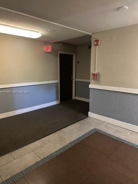 486 Northwest 165th Street, Unit B302 Miami, FL 33169 - Photo 8 of 34 a view of an empty room