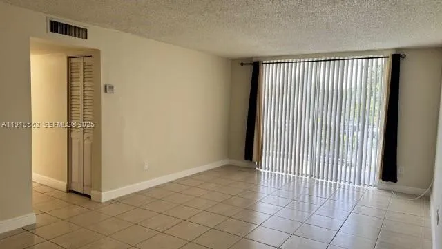 a view of a garden from a balcony