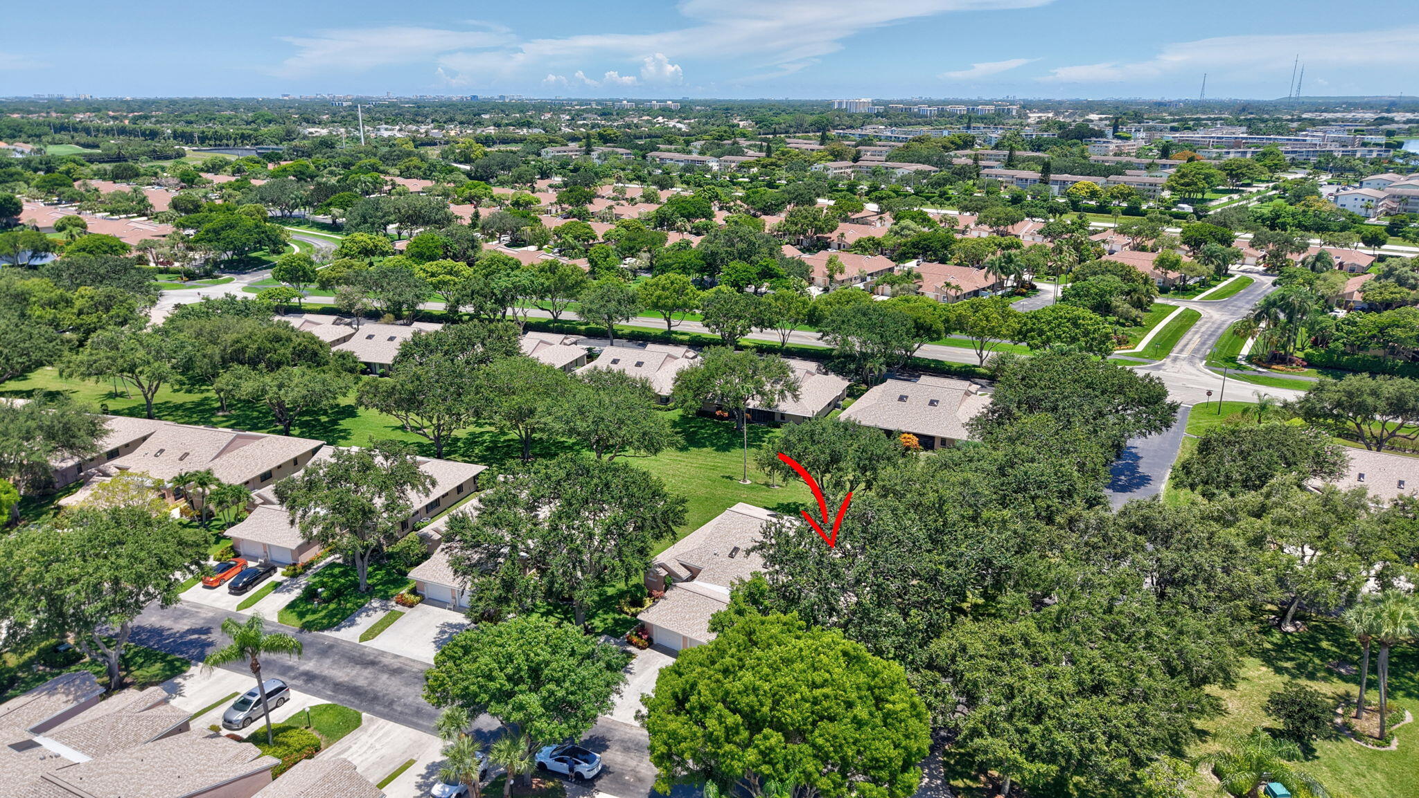 8306 Summersong Terrace Boca Raton, FL 33496 - Photo 50 of 51 an aerial view of a city and mountain