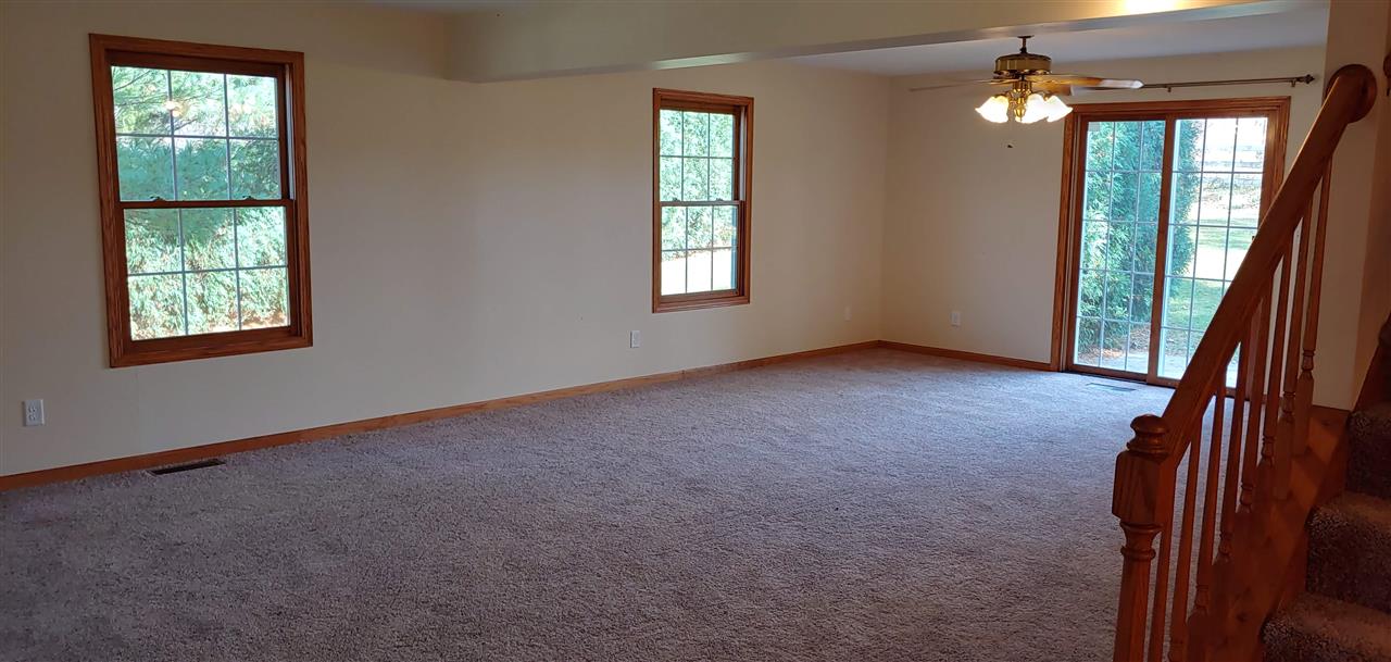 20979 Free Church Road Caledonia, IL 61011 - Photo 18 of 40 an empty room with windows and closet