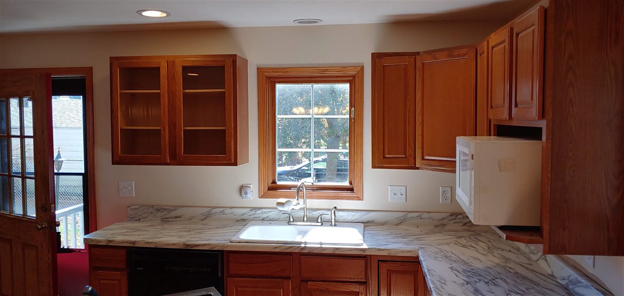 20979 Free Church Road Caledonia, IL 61011 - Photo 19 of 40 a bathroom with a sink and a window