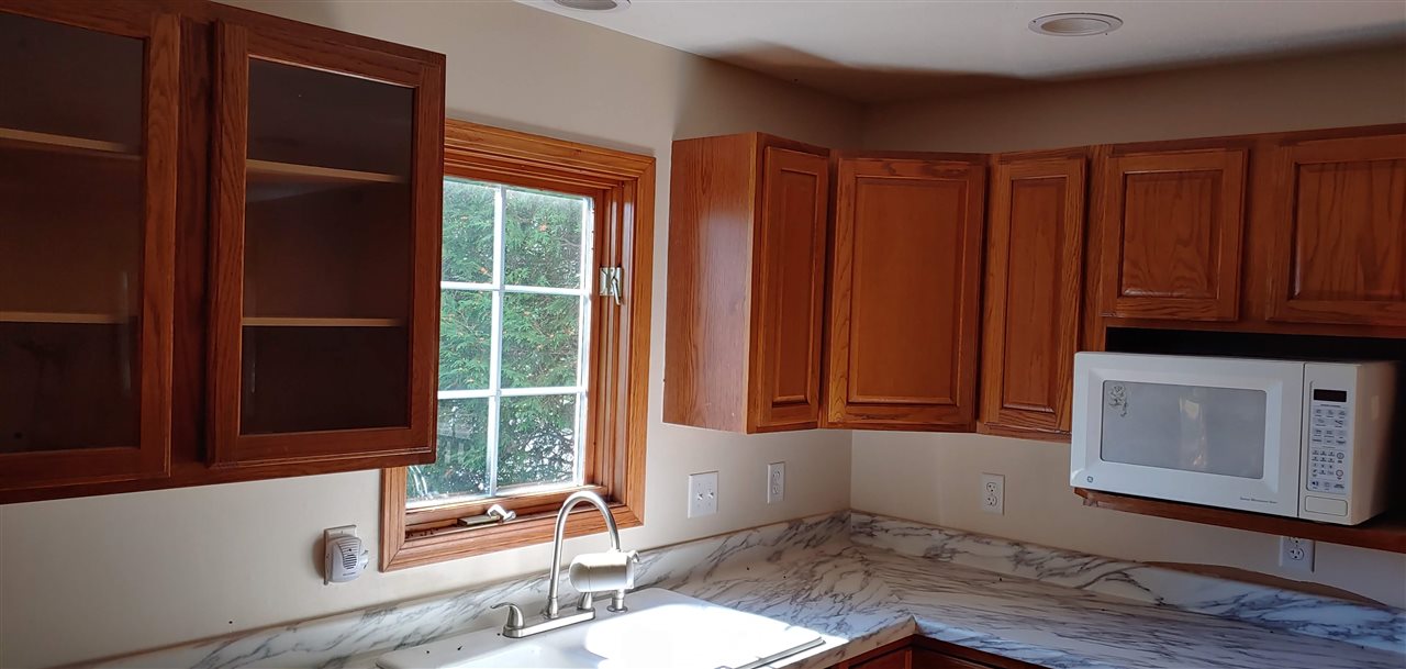 20979 Free Church Road Caledonia, IL 61011 - Photo 20 of 40 a room with furniture and window