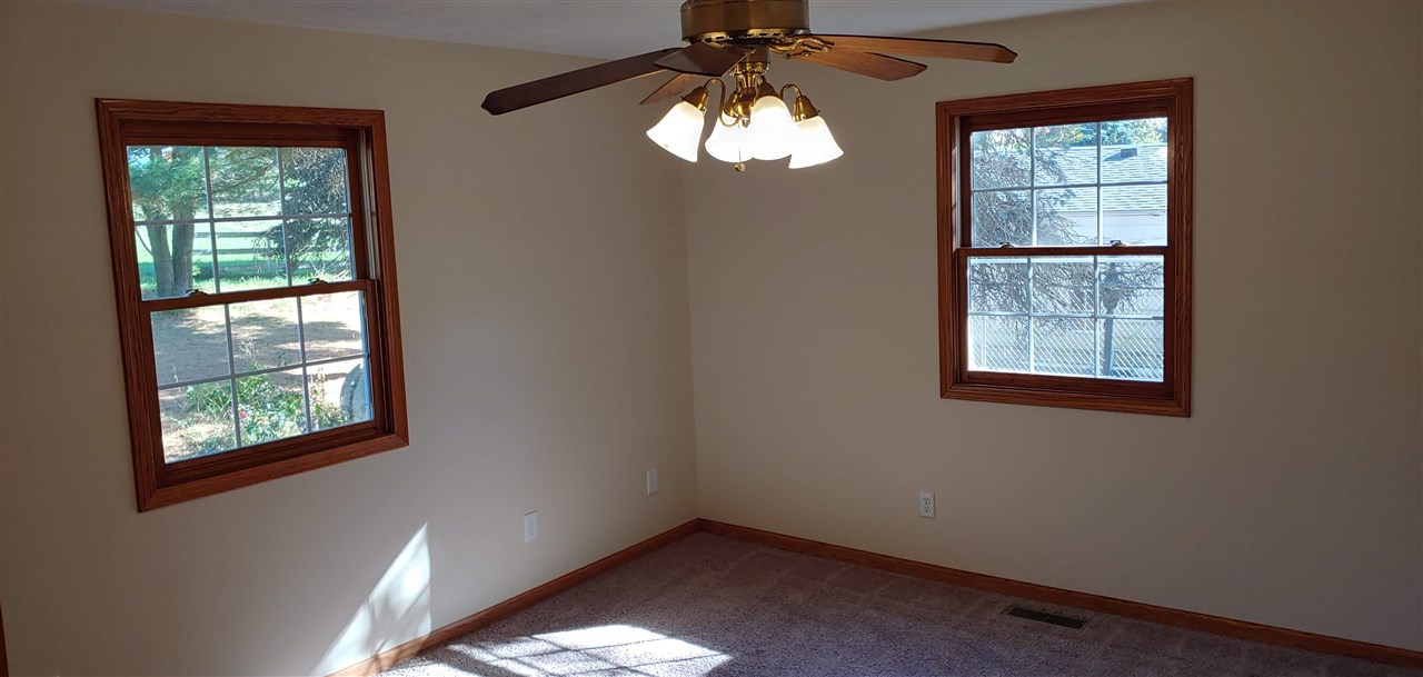 20979 Free Church Road Caledonia, IL 61011 - Photo 22 of 40 an empty room with a window