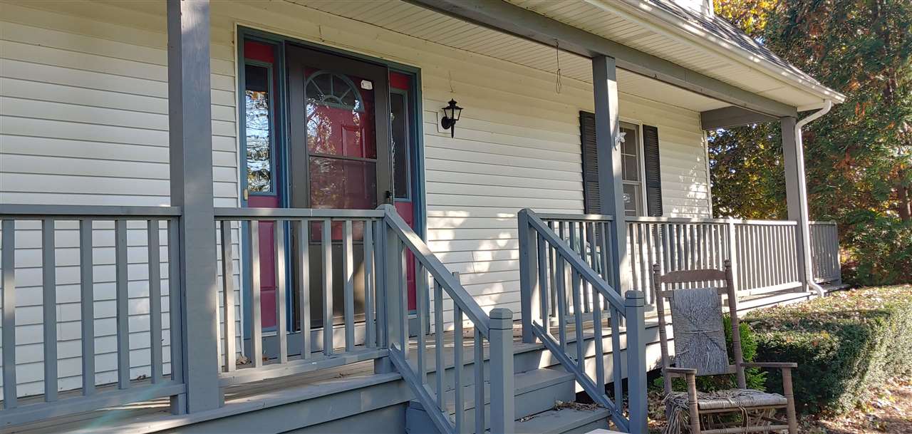 20979 Free Church Road Caledonia, IL 61011 - Photo 3 of 40 a view of a house with a porch