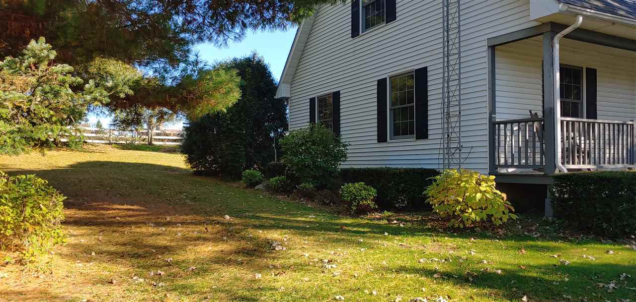 20979 Free Church Road Caledonia, IL 61011 - Photo 34 of 40 a view of a house with a yard