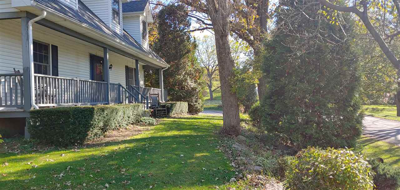 20979 Free Church Road Caledonia, IL 61011 - Photo 35 of 40 a view of a house with a yard