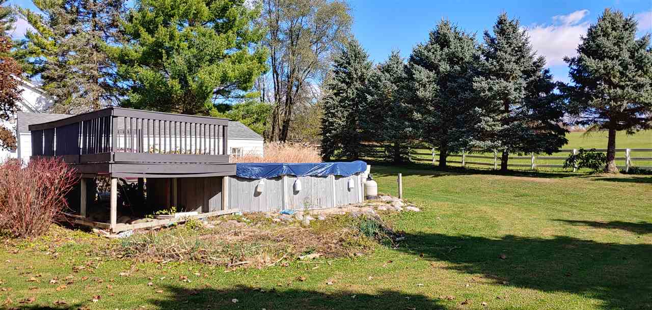 20979 Free Church Road Caledonia, IL 61011 - Photo 36 of 40 a front view of a house with a yard