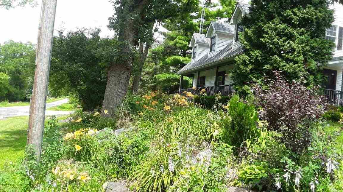 20979 Free Church Road Caledonia, IL 61011 - Photo 40 of 40 a view of a garden with plants